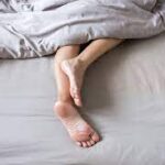 What Science Says About Sleeping with One Leg Out — and How It Affects Your Health images (1)