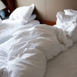 What Your Unmade Bed Says About You: The Psychology Behind It making-not-bed-750x422